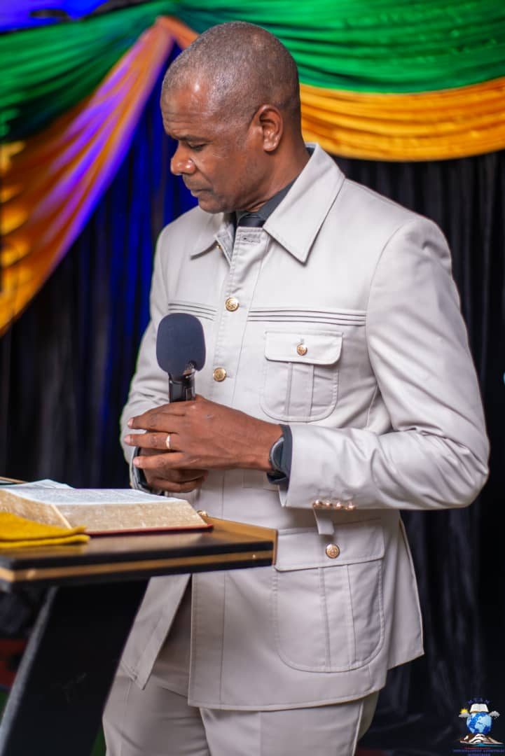 Apostle B. Jophress on the platform during service