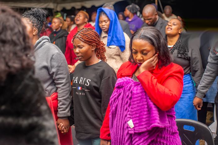 Members rejoicing in worship