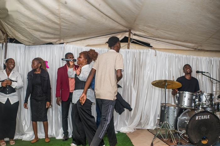 Service in progress under the tent